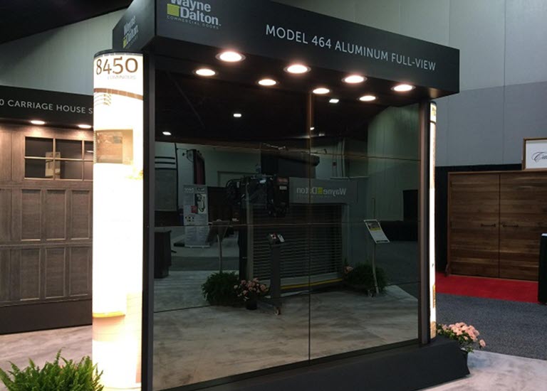 glass garage door voted hottest product - booth demo door