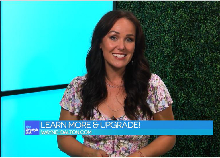 jennifer bonner with blue light and grass wall behind her and blue text box with learn more and upgrade call out