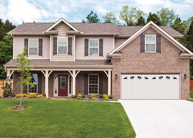 vinyl garage door traditional home