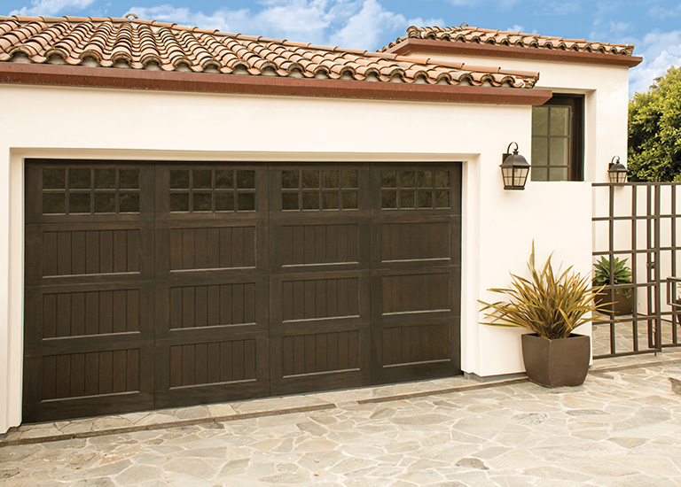 brown wood panel garage door