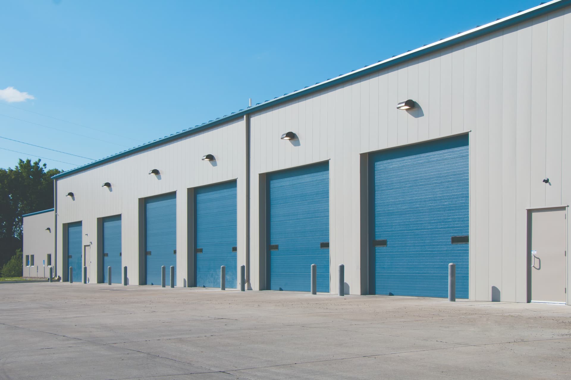 warehouse with Wayne Dalton ThermoSpan 150 TruChoice Vision Lites sectional steel doors