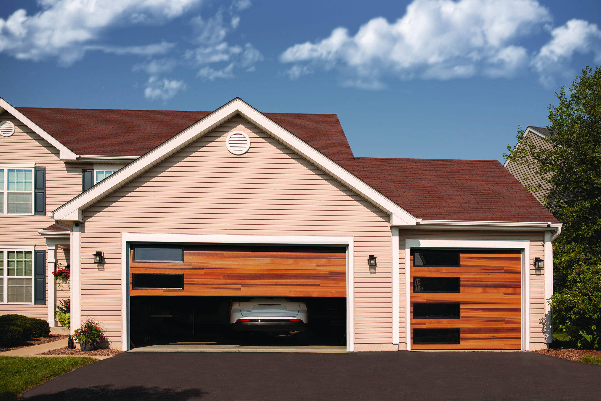Home with Wayne Dalton wood garage door closing