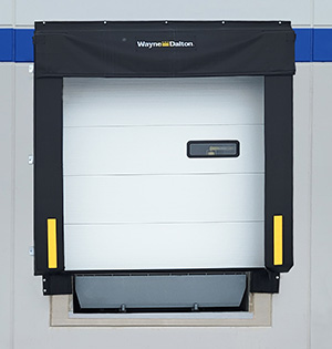 adjustable curtain seal for dock equipment on commercial building