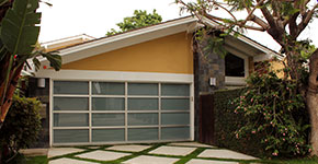 contemporary-home-8800 Modern Home with Glass Garage Door