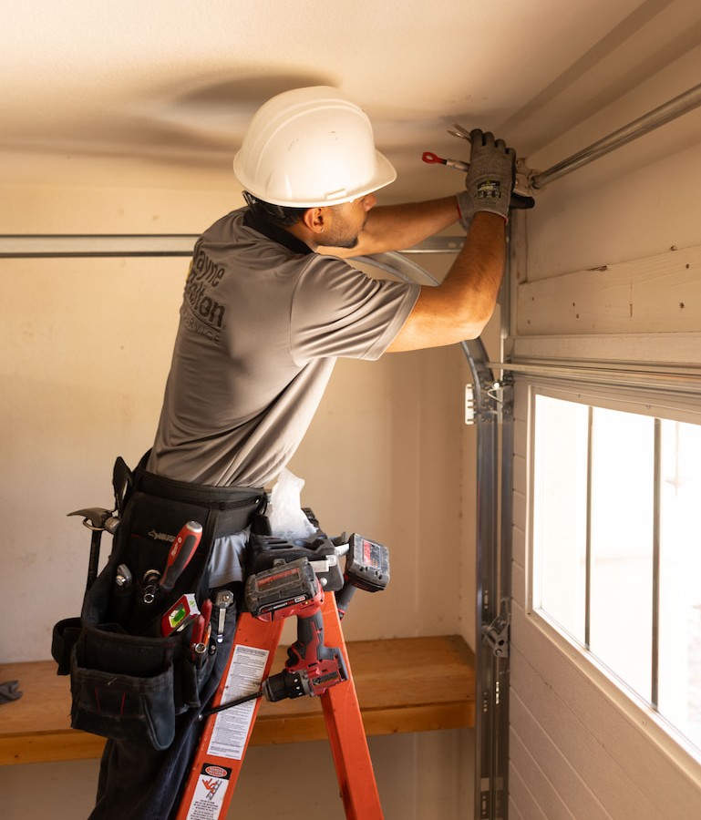 WDSS technician inspects garage door springs