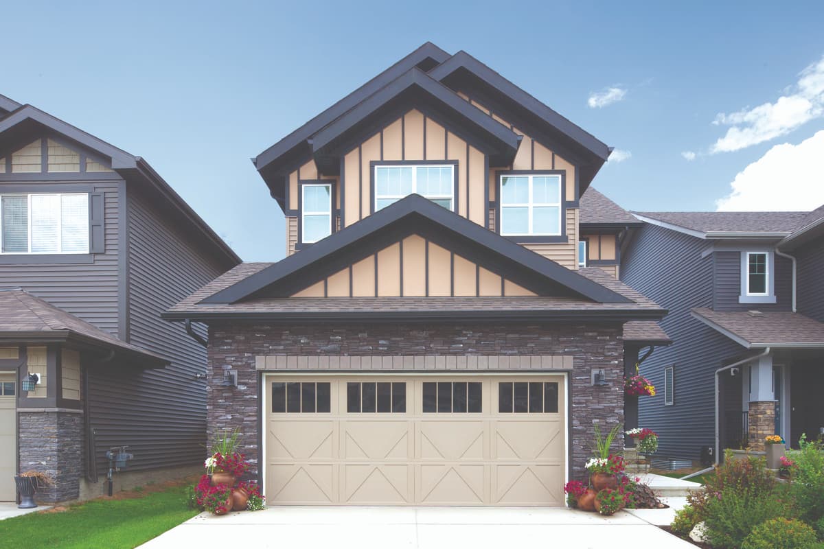 Wayne Dalton 8670 lexington beige garage door for suburban home