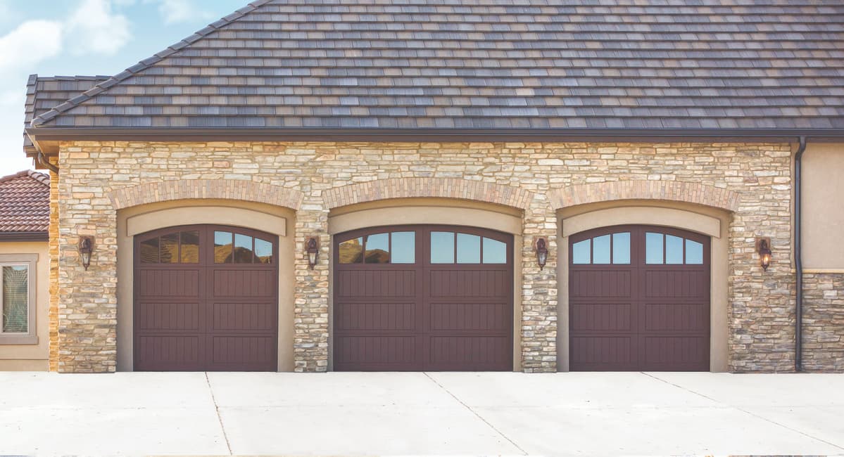 Wayne Dalton Model 7103 garage doors with arched window design