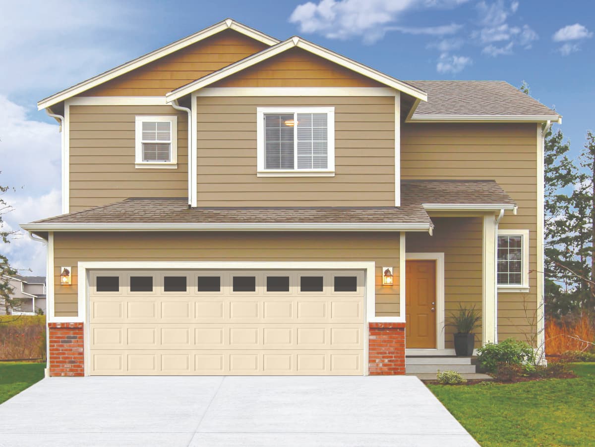 Wayne Dalton Model 8000 steel garage door in colonial almond